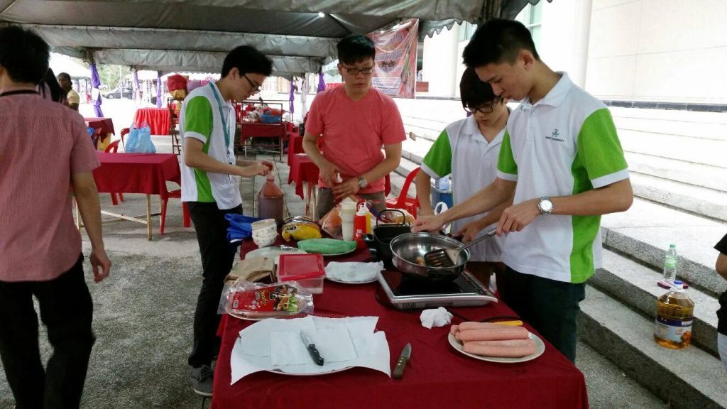 The cooks with the first batch of sausages~